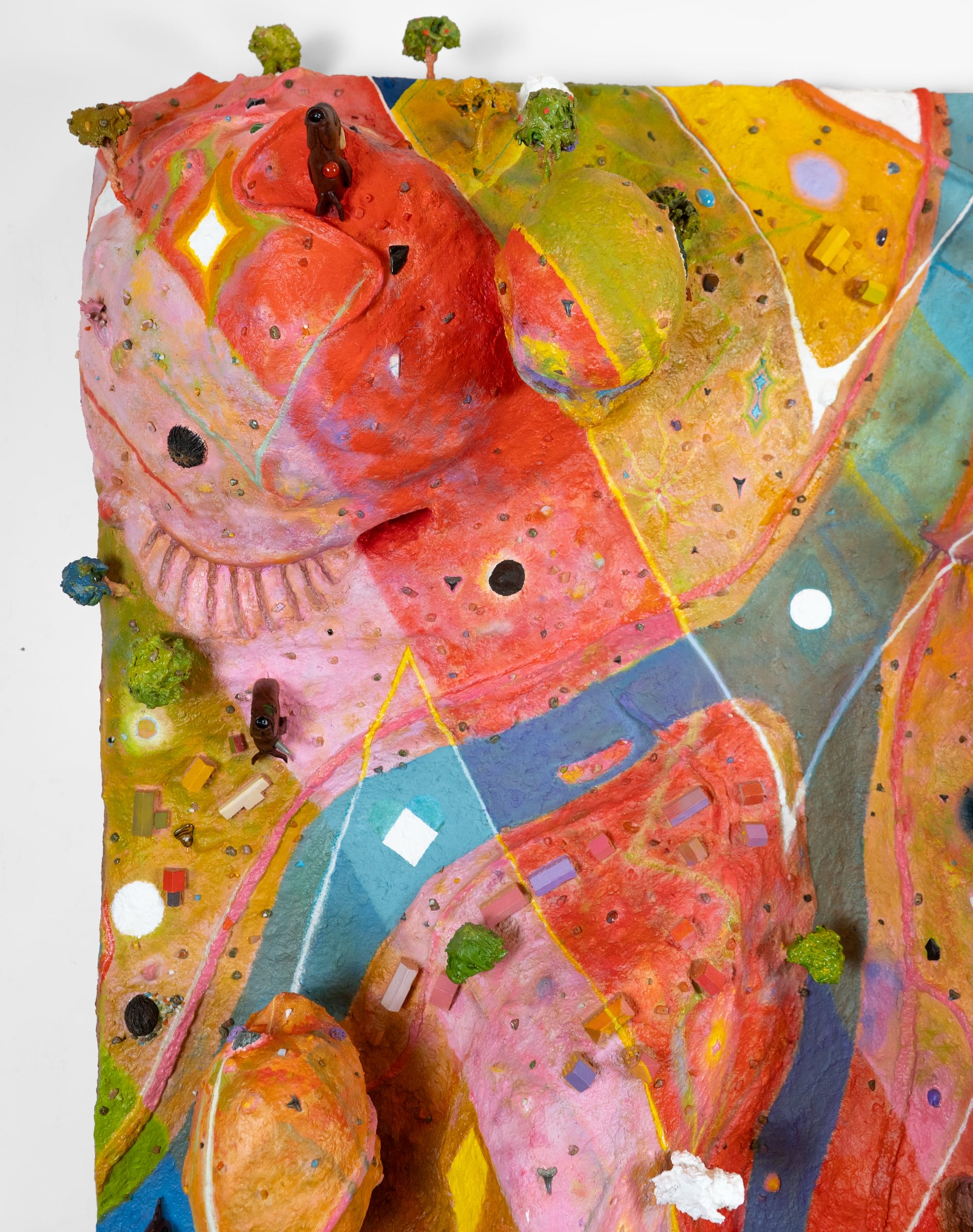 a striped sculptural painting as a colorful topography