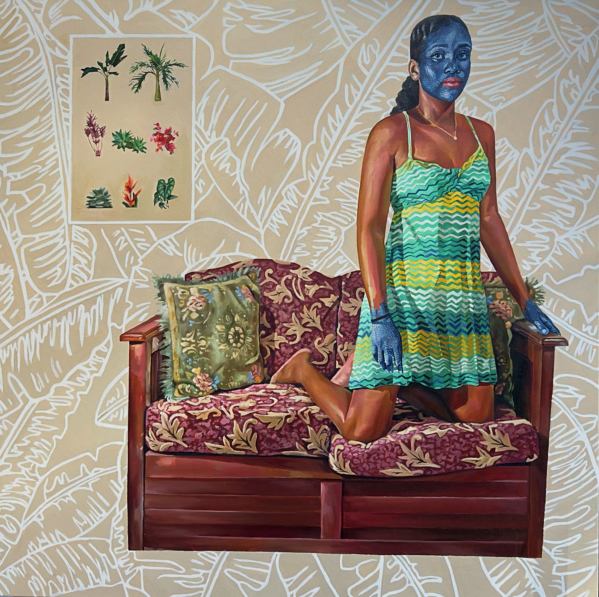 a portrait of a woman with her knee on a small couch wearing a blue mask