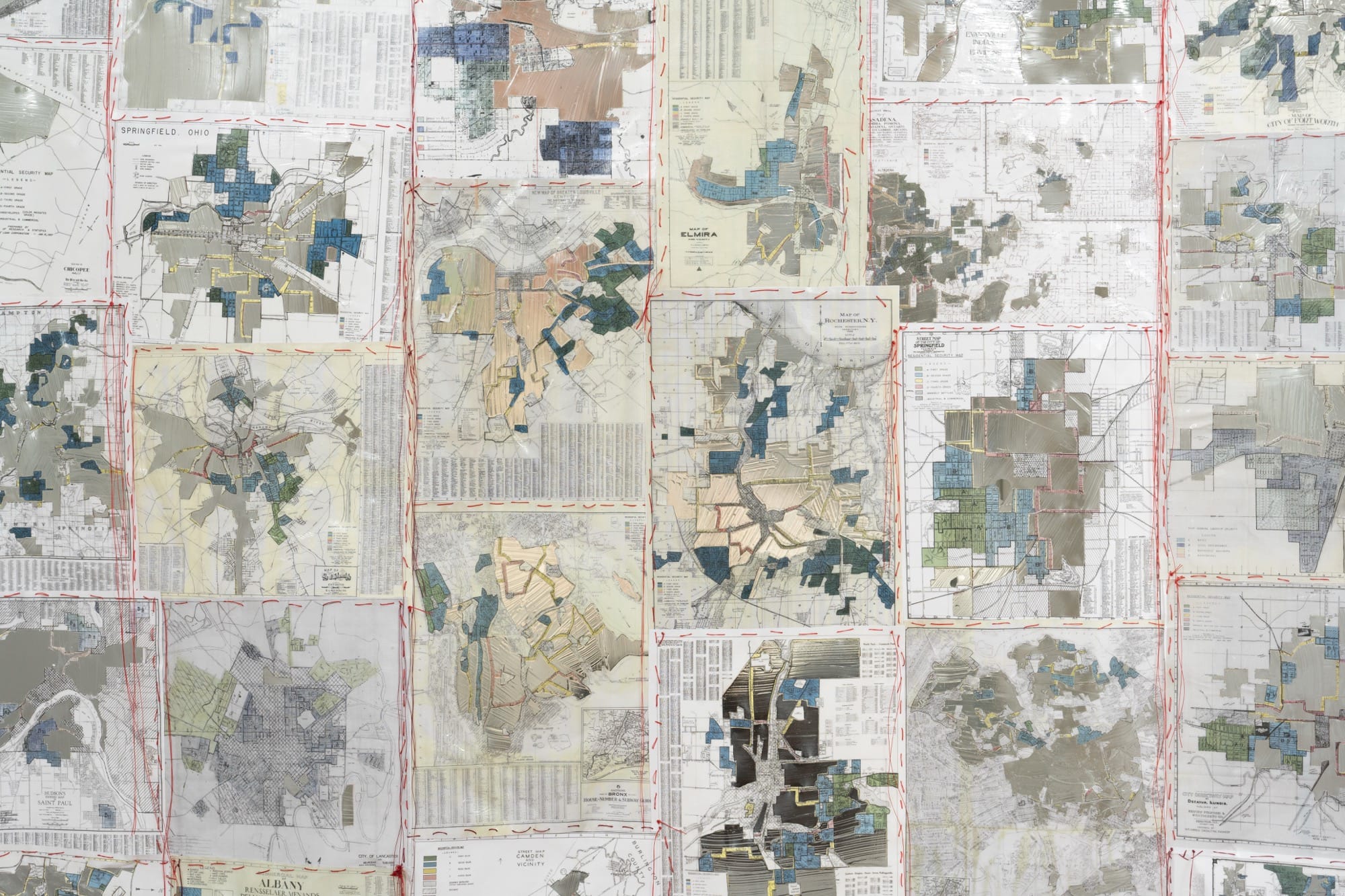 a detail image of a tapestry of maps