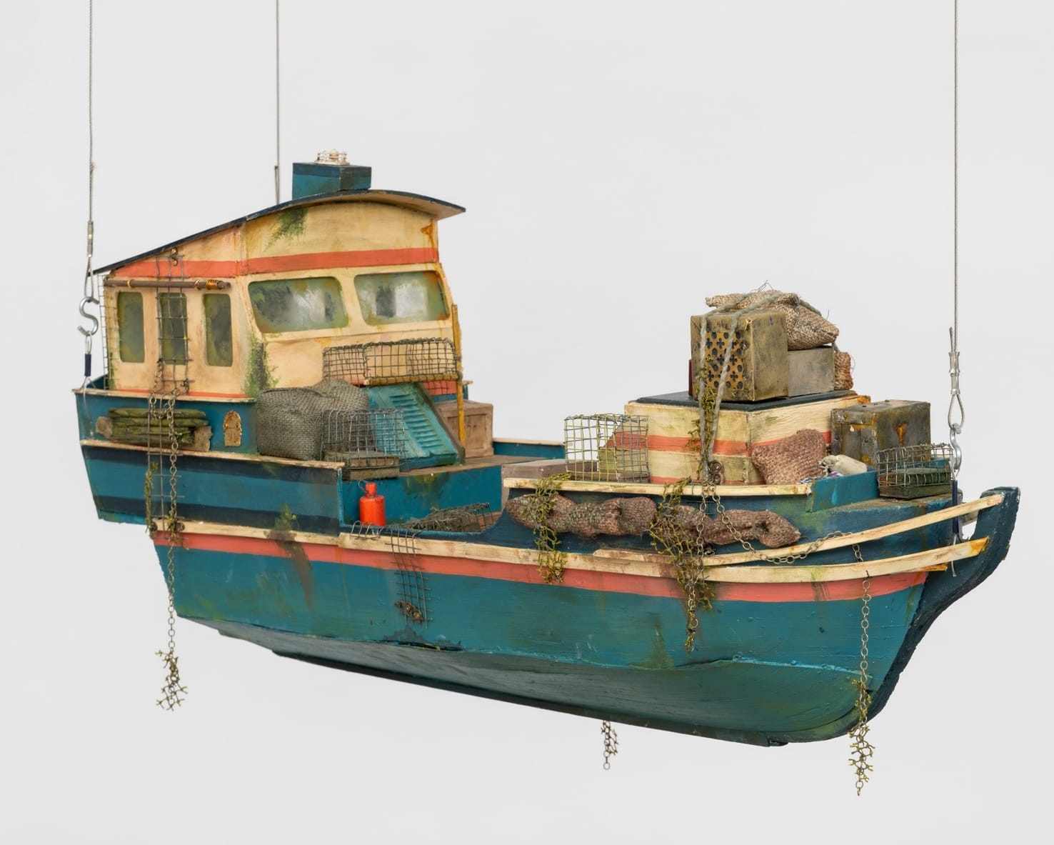 a sculpture of a fishing boat