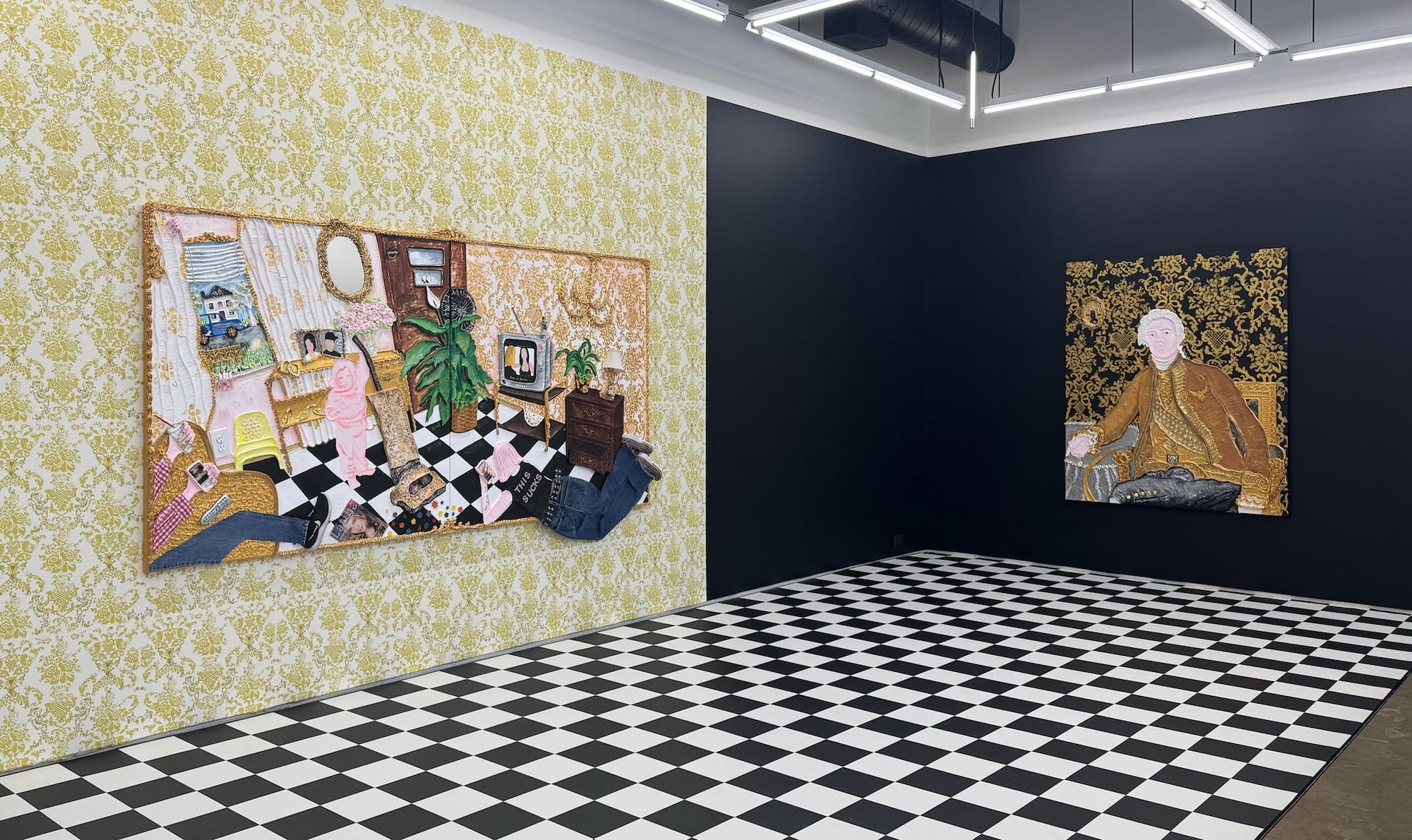 two mixed-media paintings in a gallery with a tile floor installation and ornate wallpaper behind one painting, the other on a black wall