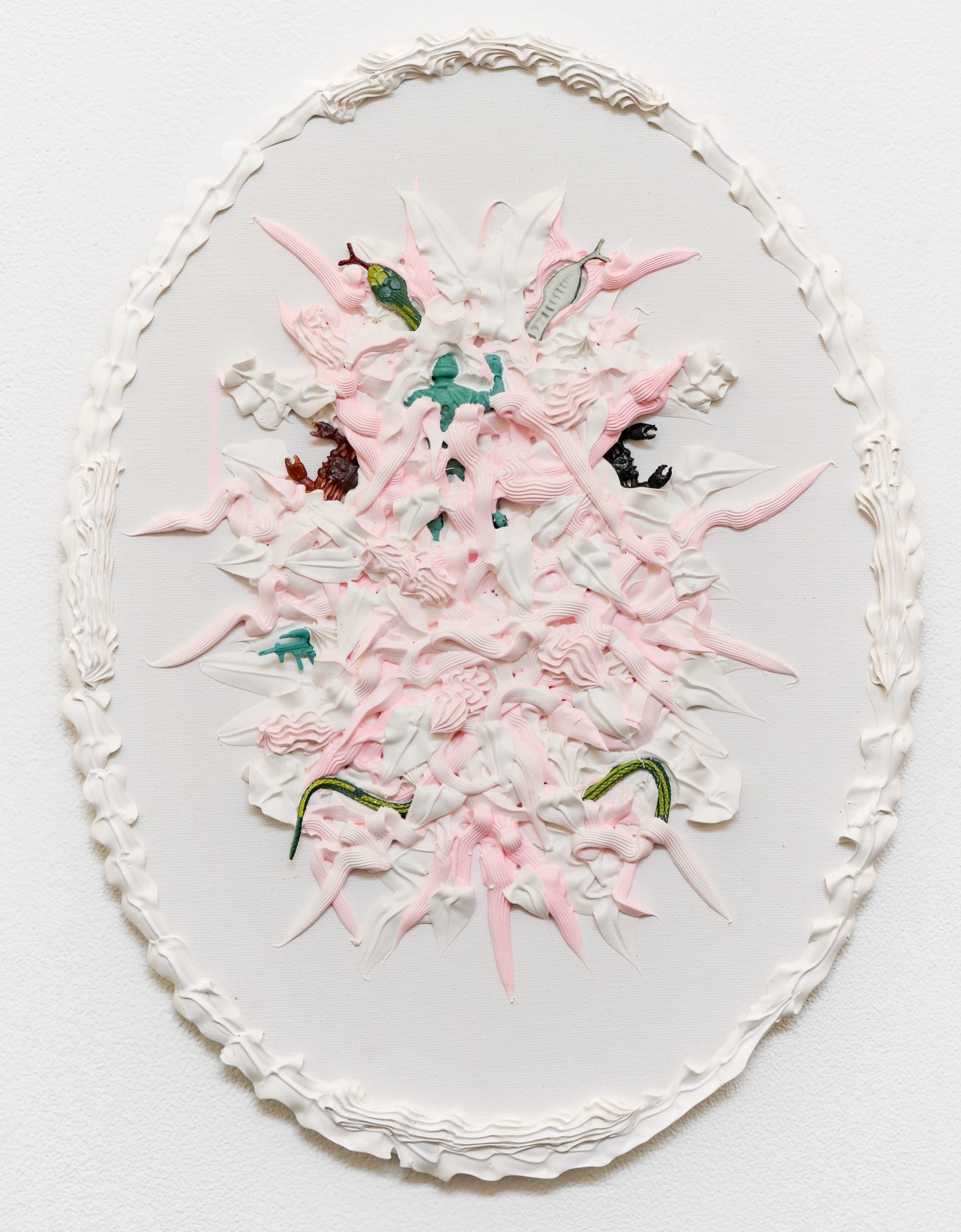 an oval mixed-media painting with flowers in relief